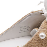 Stuart Weitzman Goldie Mules en Rafia Beige