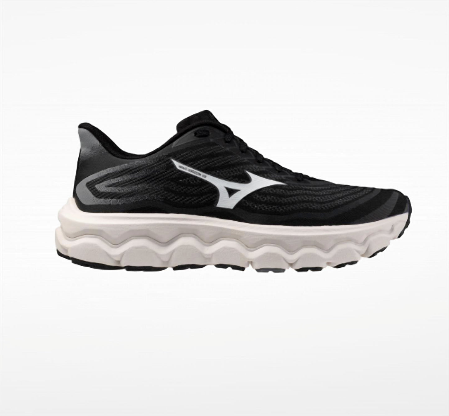 Tenis para correr de mujer color negro y blanco