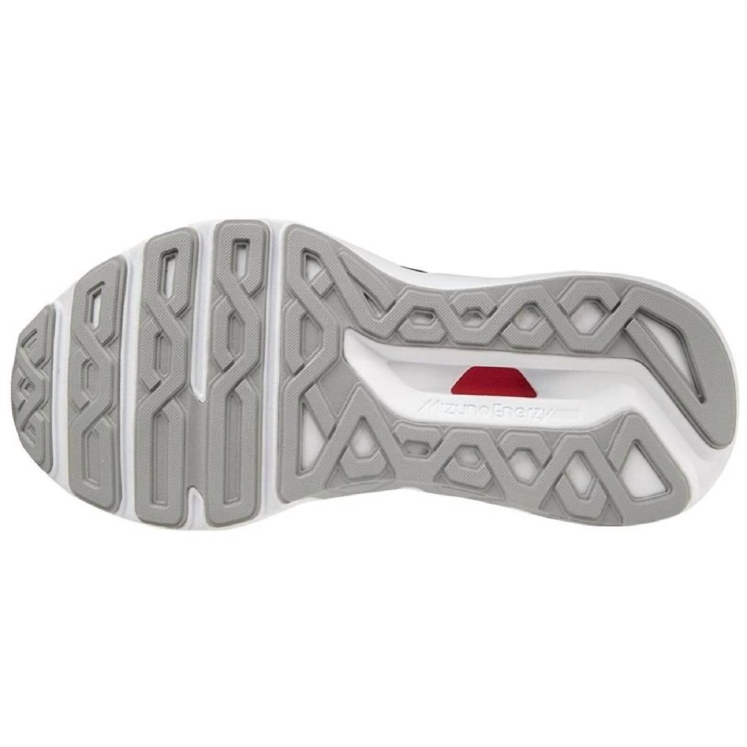 Tenis para correr de mujer color gris y plateado