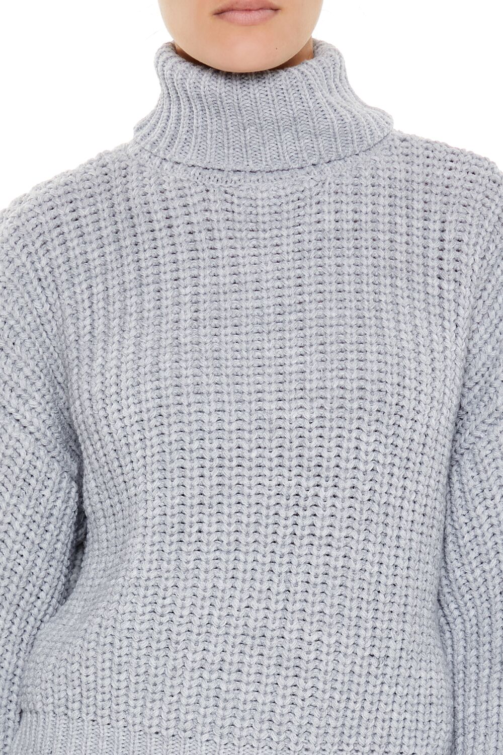 Suéter con cuello alto