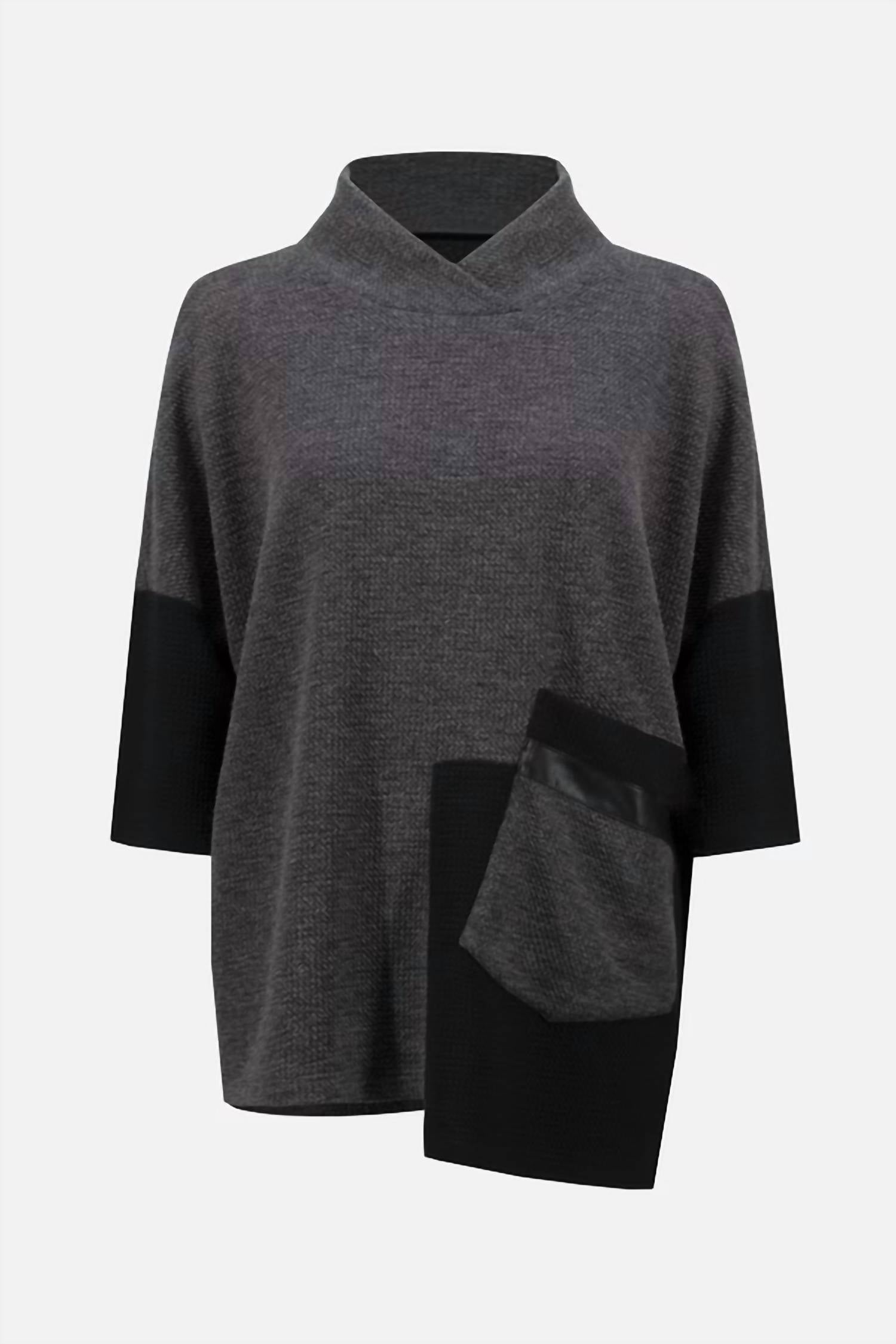 Suéter con cuello alto de corte amplio color negro y gris