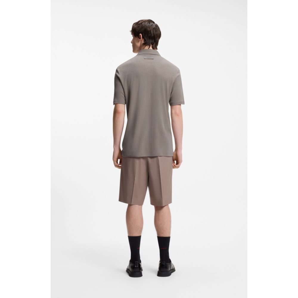 Polo de corte ajustado