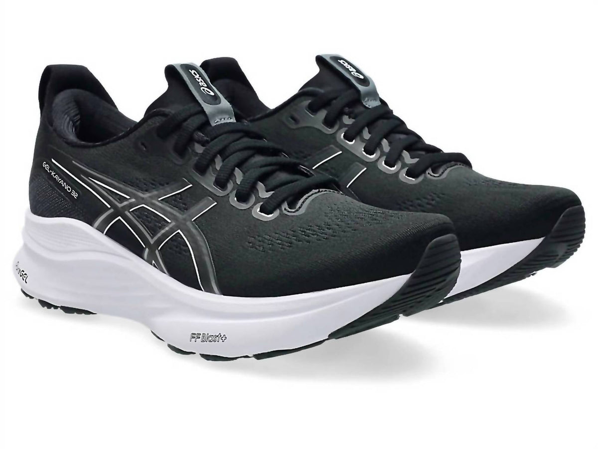 Tenis para correr de mujer color negro y blanco