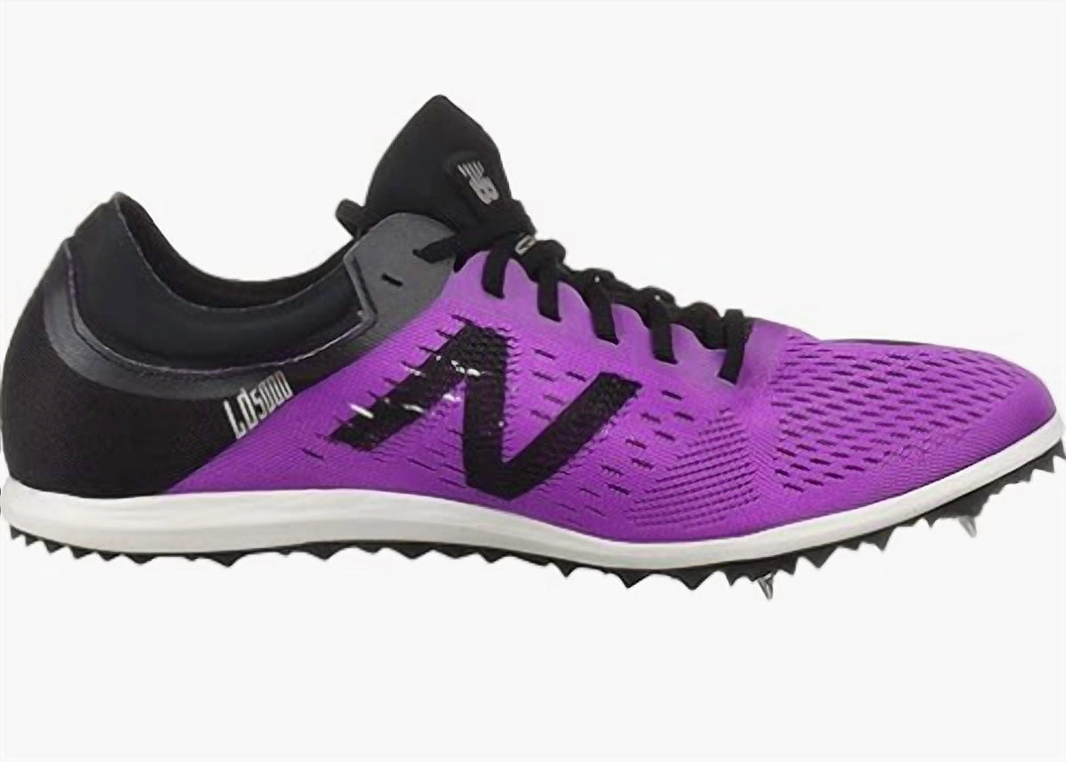 Zapatillas con clavos de mujer color negro y violeta