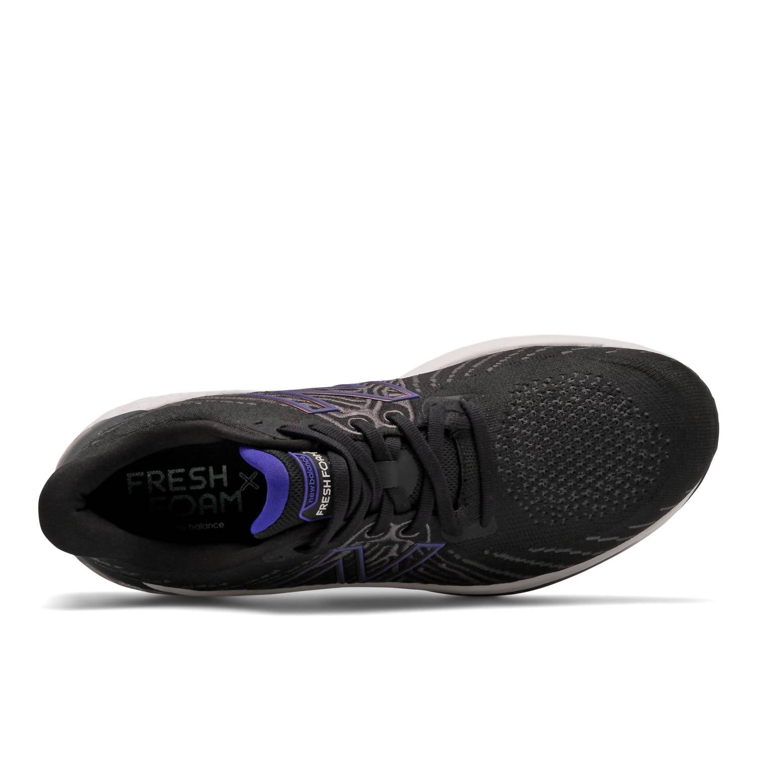Tenis para correr de hombre color negro y violeta