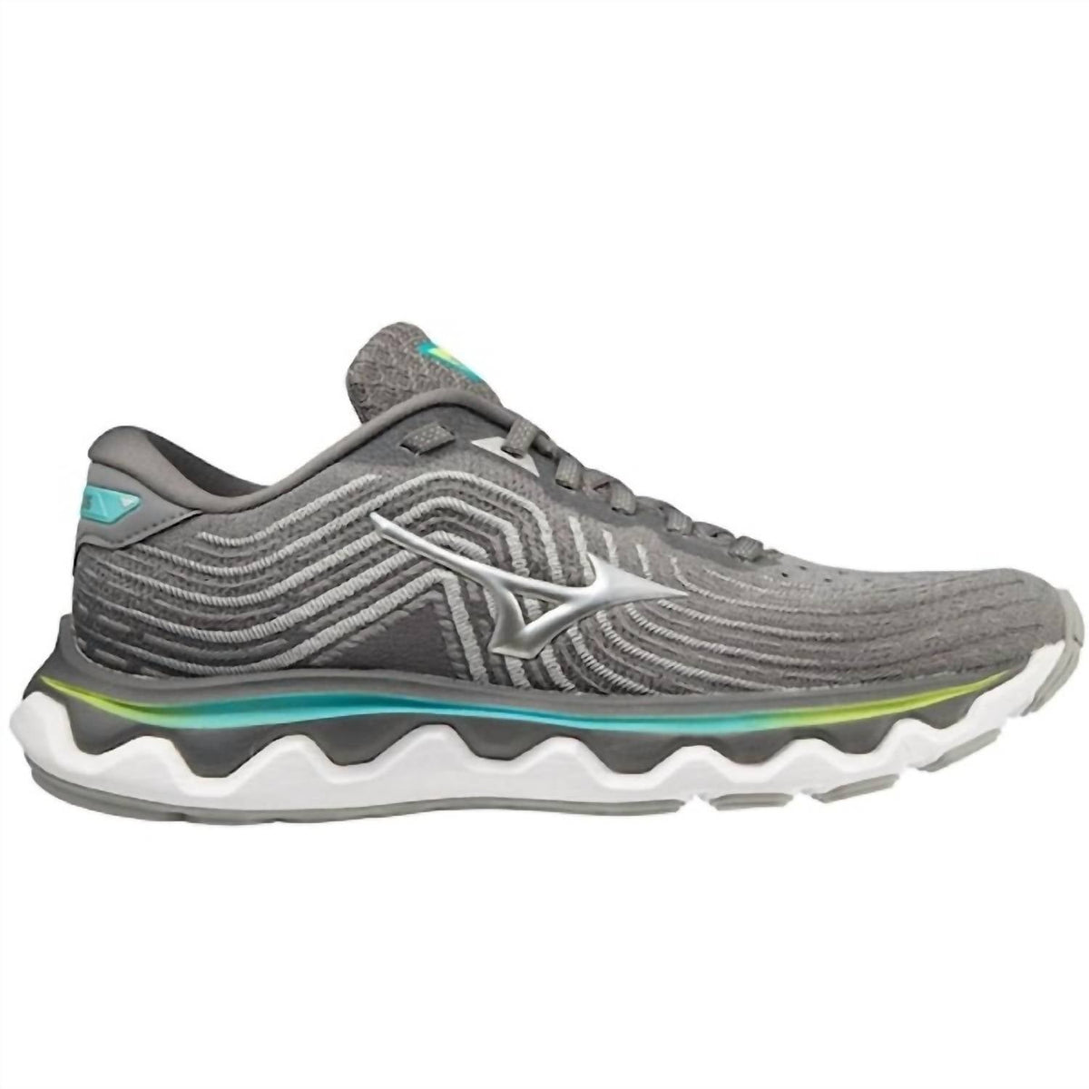 Tenis para correr de mujer color gris y plateado
