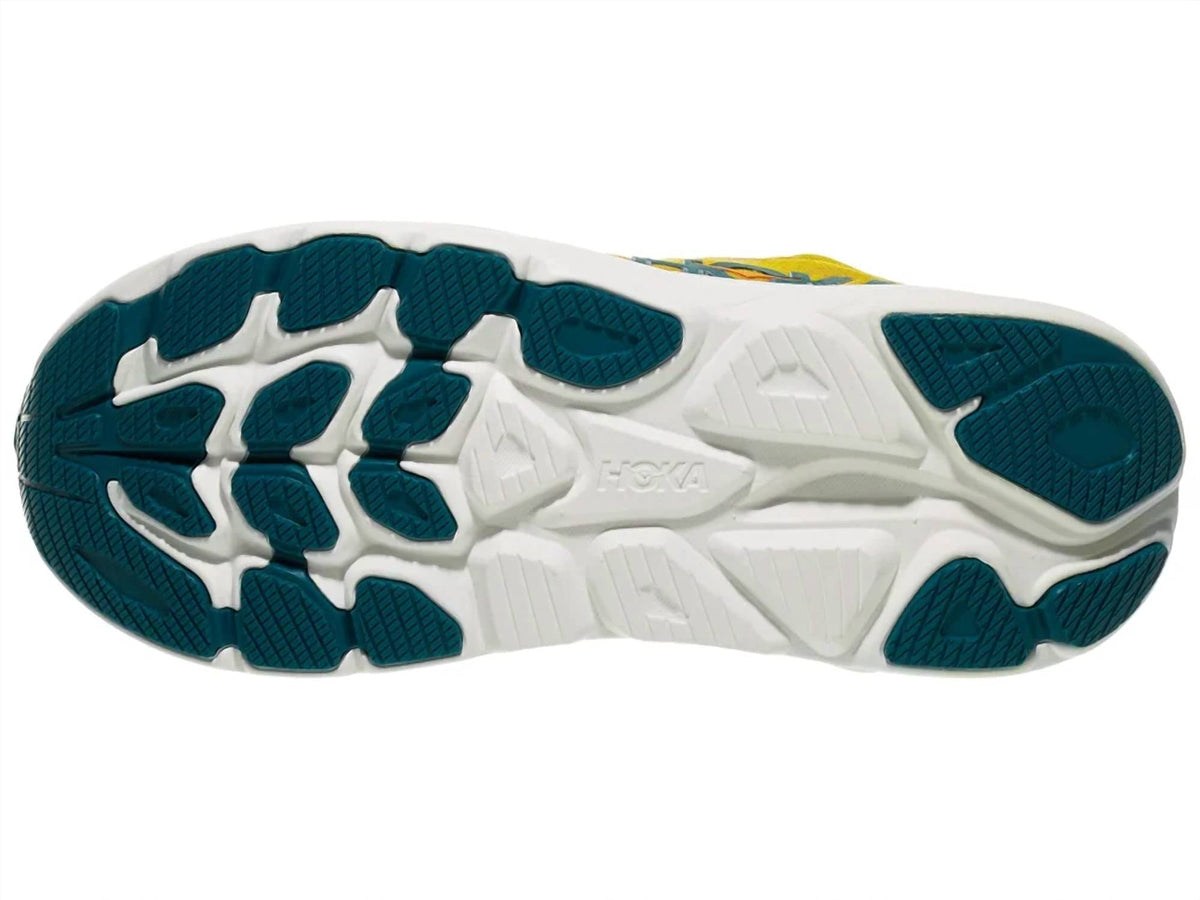 Tenis para correr de hombre color amarillo y dorado