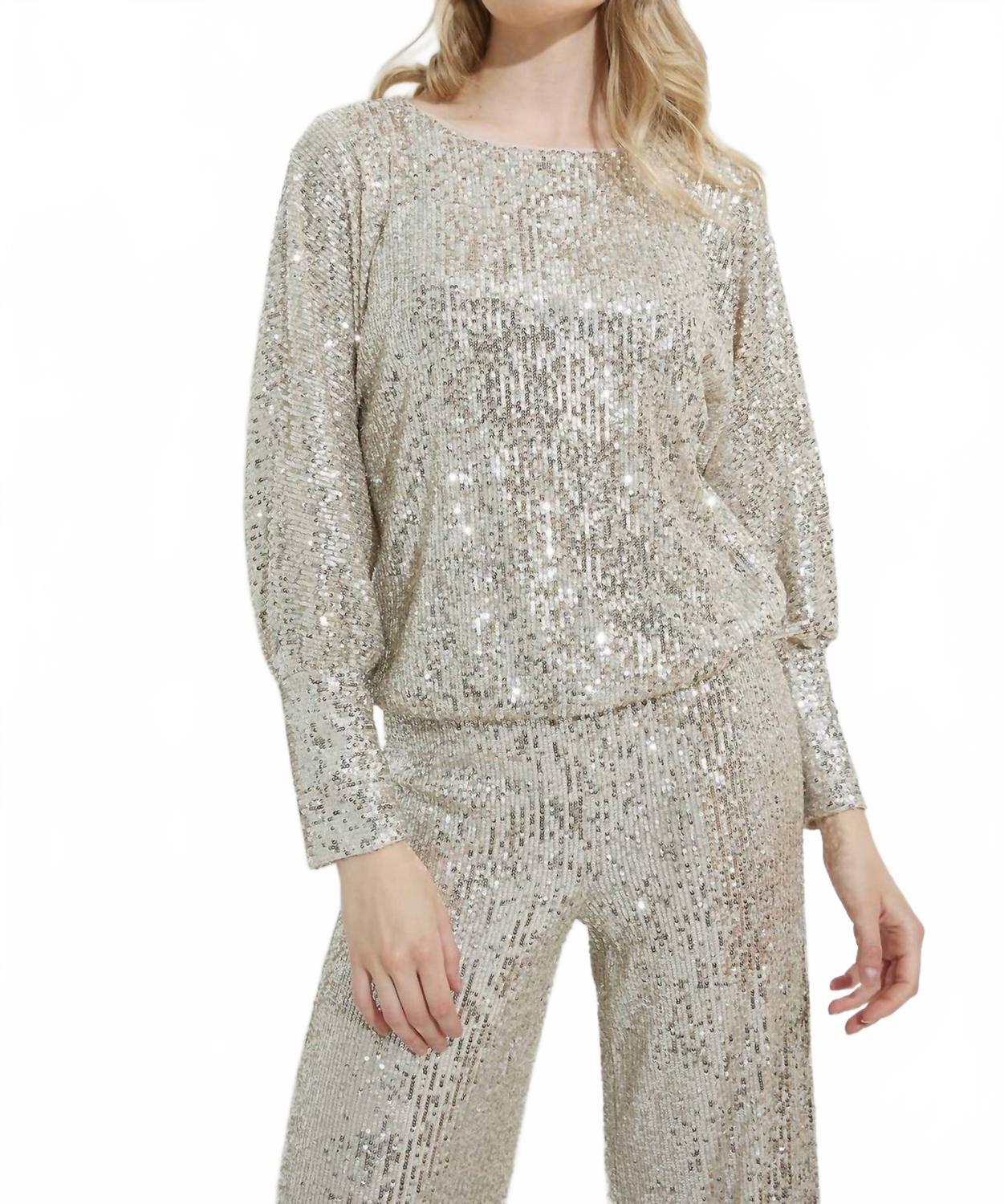 Blusa con lentejuelas color plateado y nude