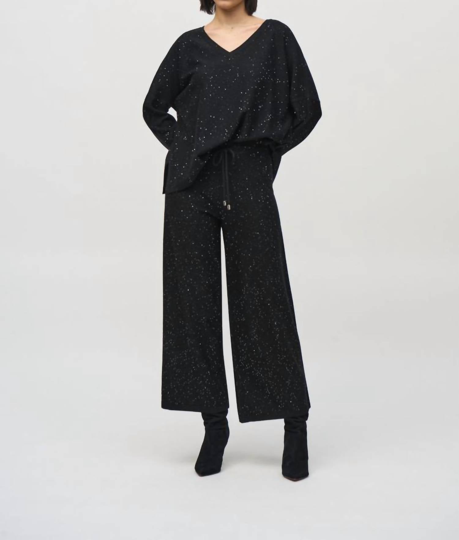 Pantalón de mujer de pierna ancha con lentejuelas color negro