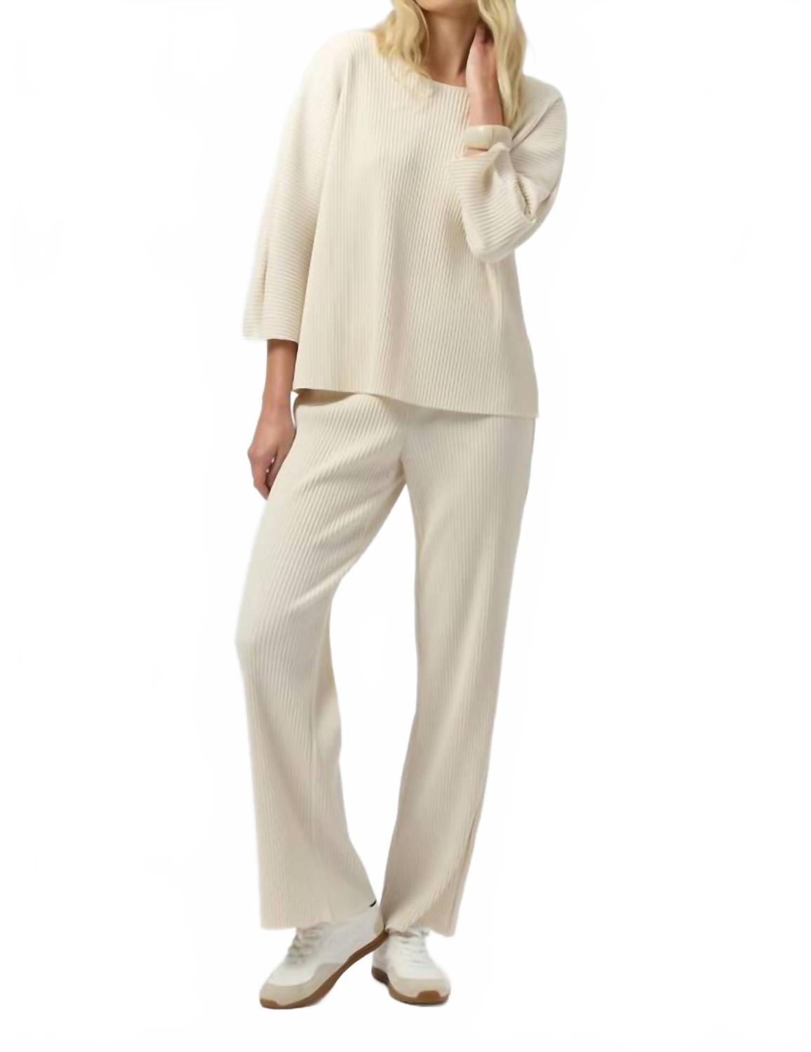 Pantalón con pliegues