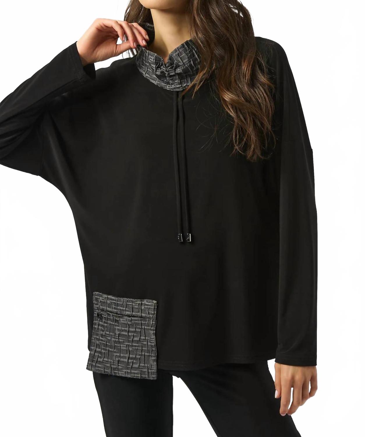 Top de manga larga color negro y gris