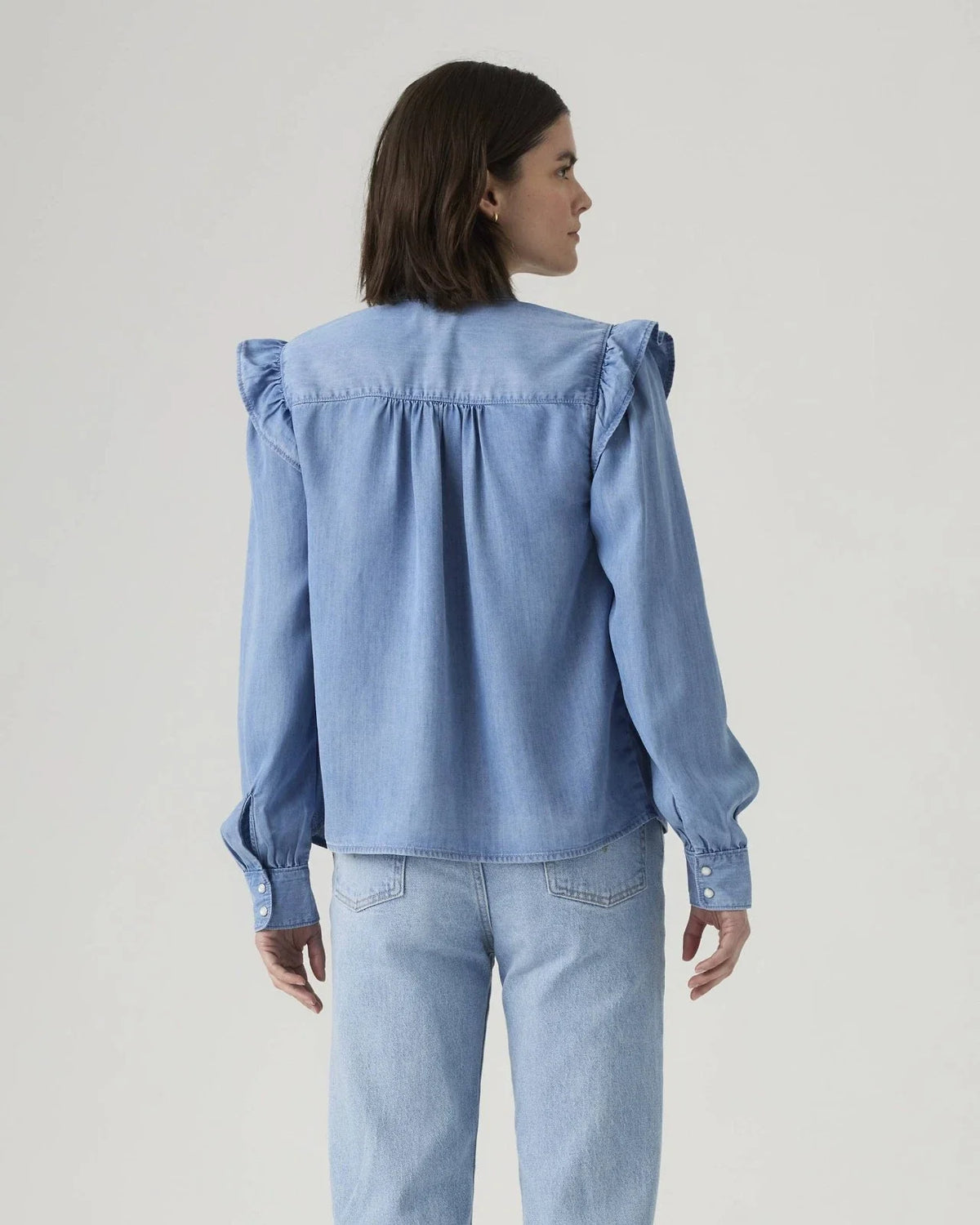 Blusa de mujer de manga larga con boleros color azul