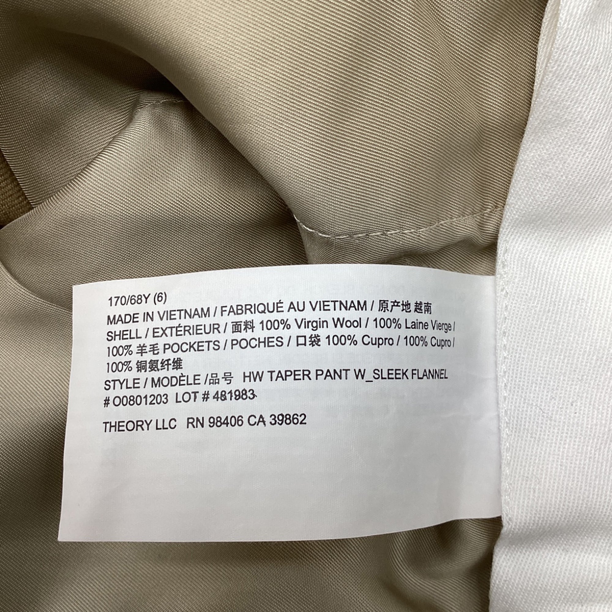 Pantalón de lana de tiro alto color beige