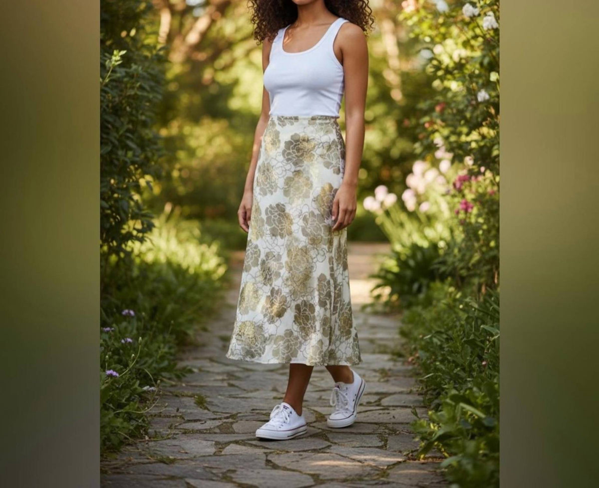 Falda midi con estampado floral color dorado y crema