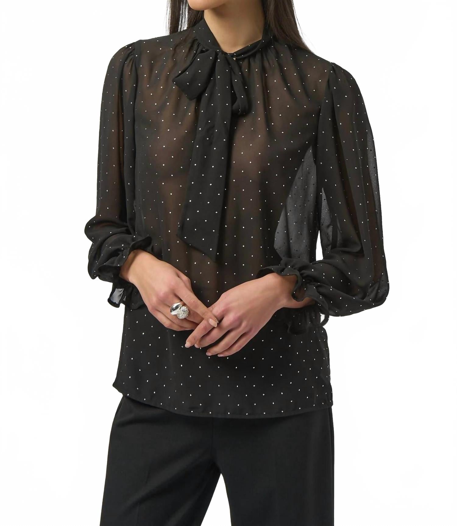 Top de gasa color negro y plateado