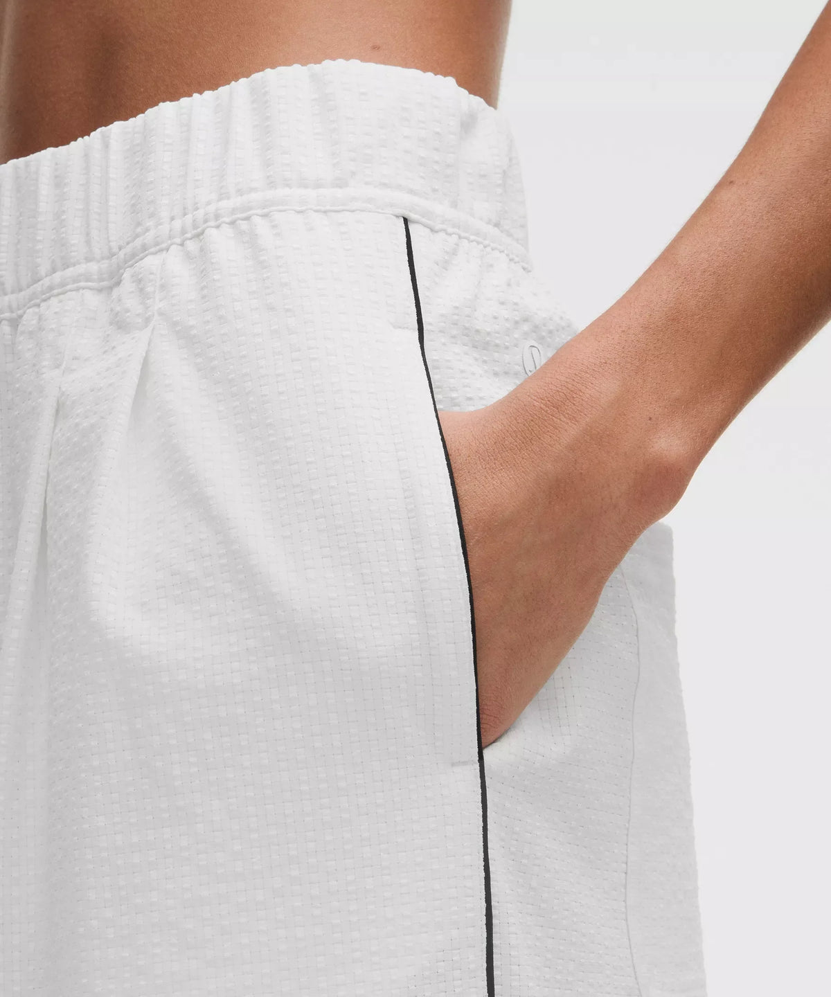 Pantalón de tiro alto con pliegues