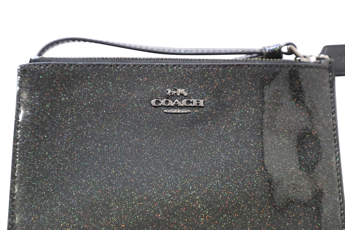 Bolso de muñeca de cuero color negro