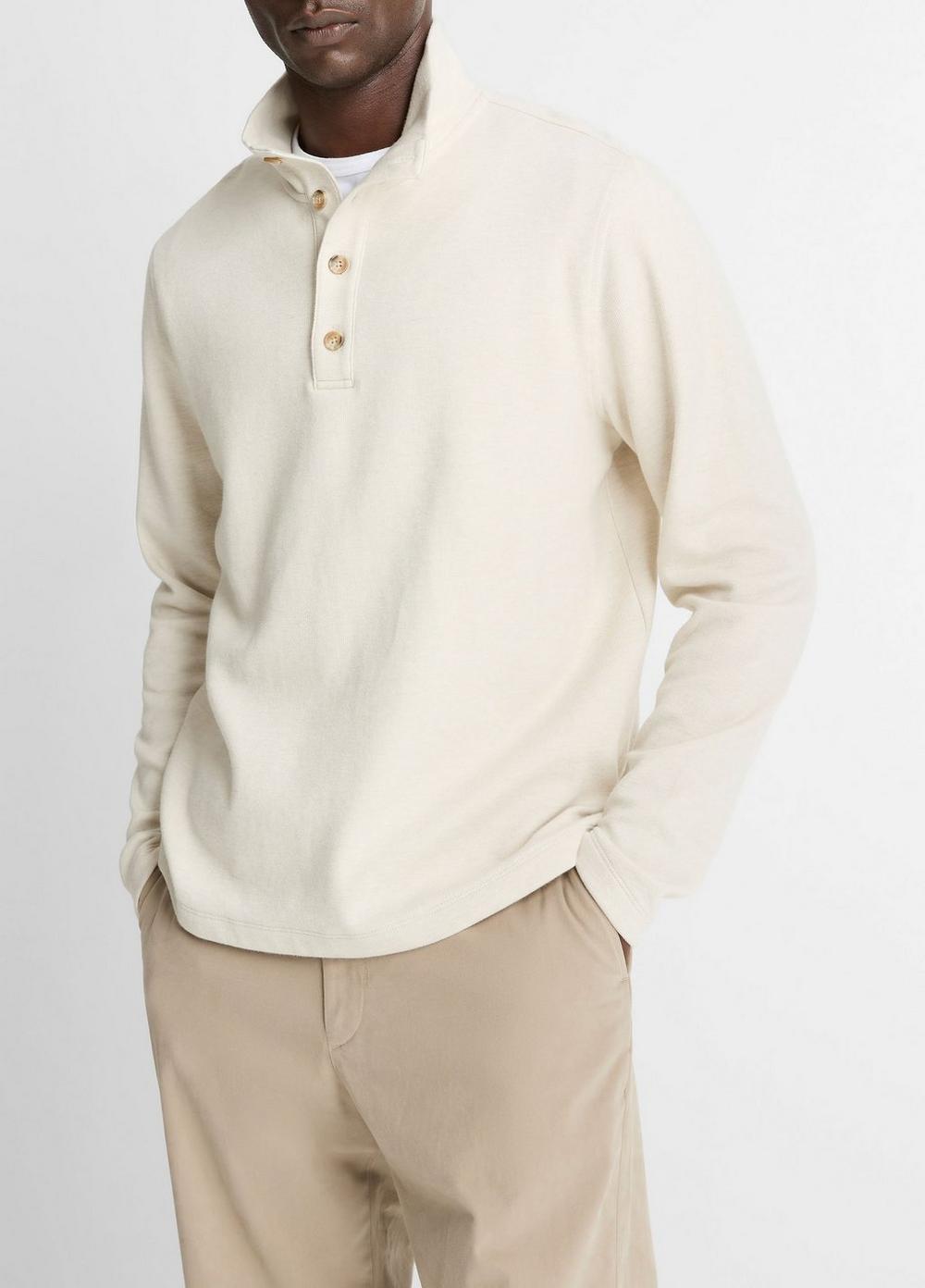 Suéter de algodón con cuello alto