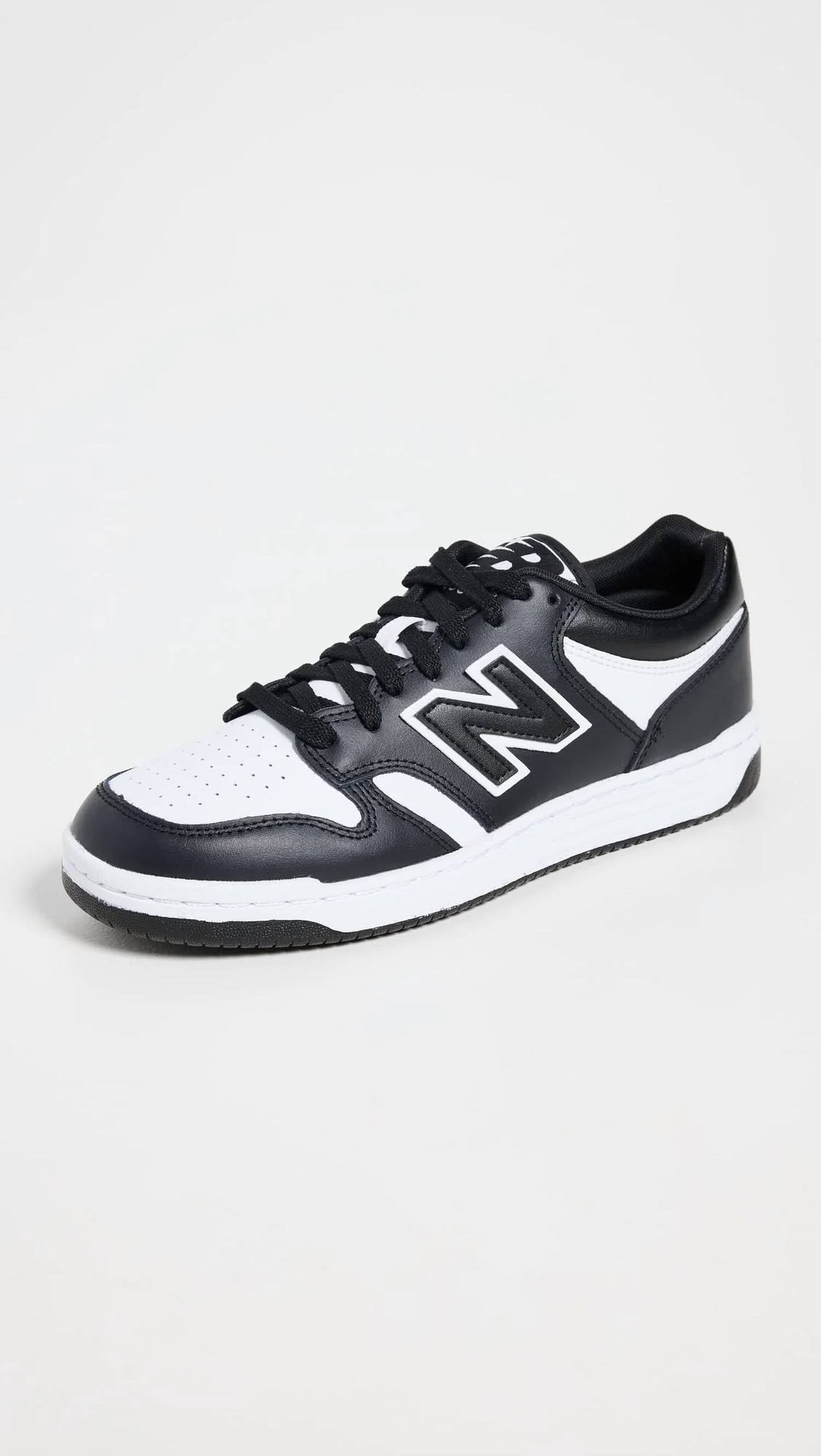 Tenis unisex color negro y blanco