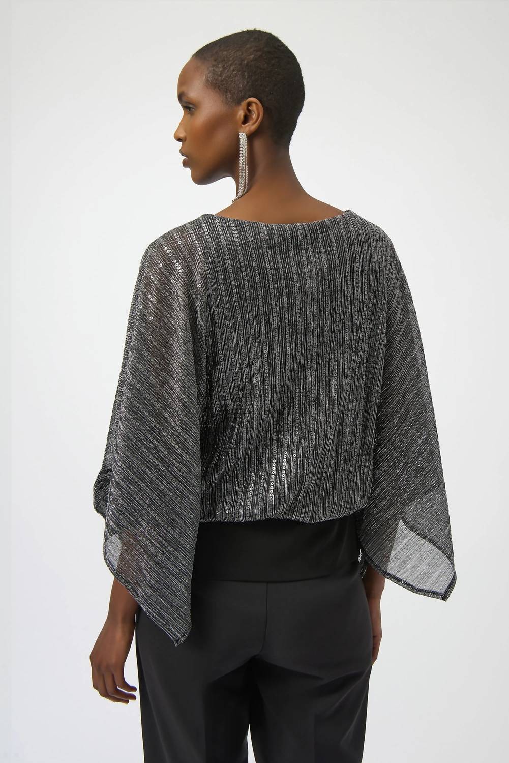 Top con lentejuelas color negro y plateado