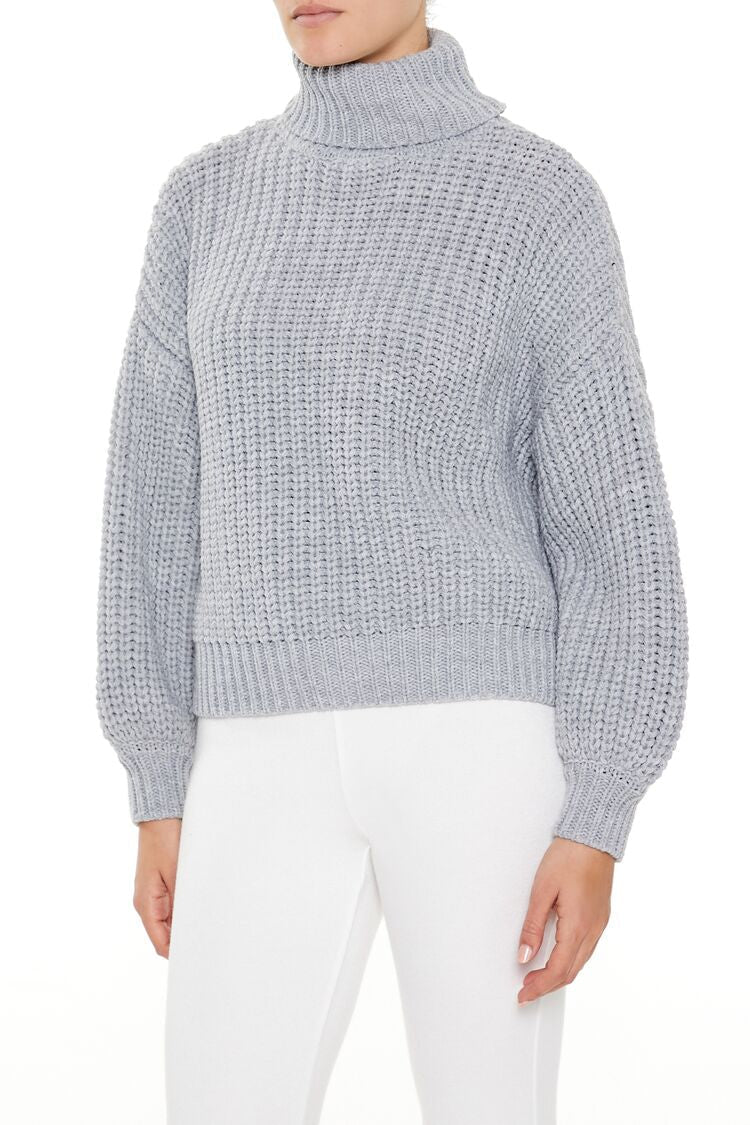 Suéter con cuello alto