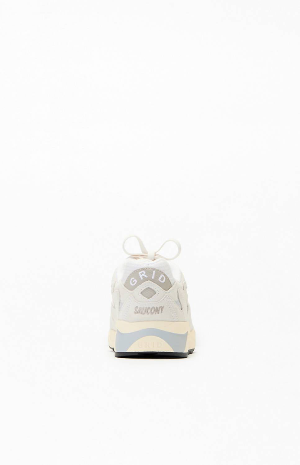 Tenis unisex color blanco y crema