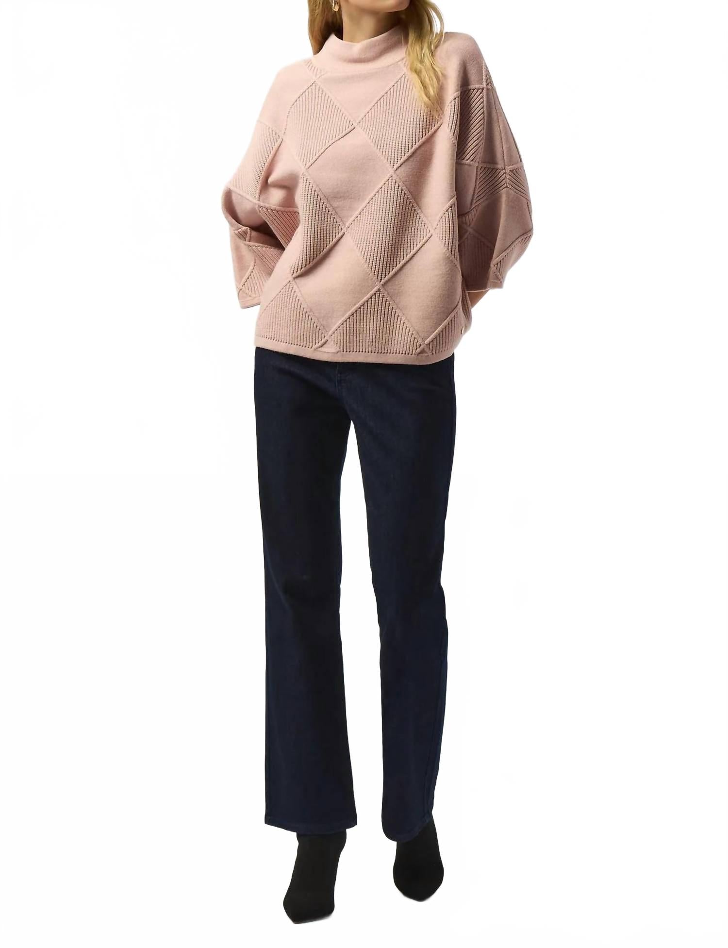 Suéter con cuello alto
