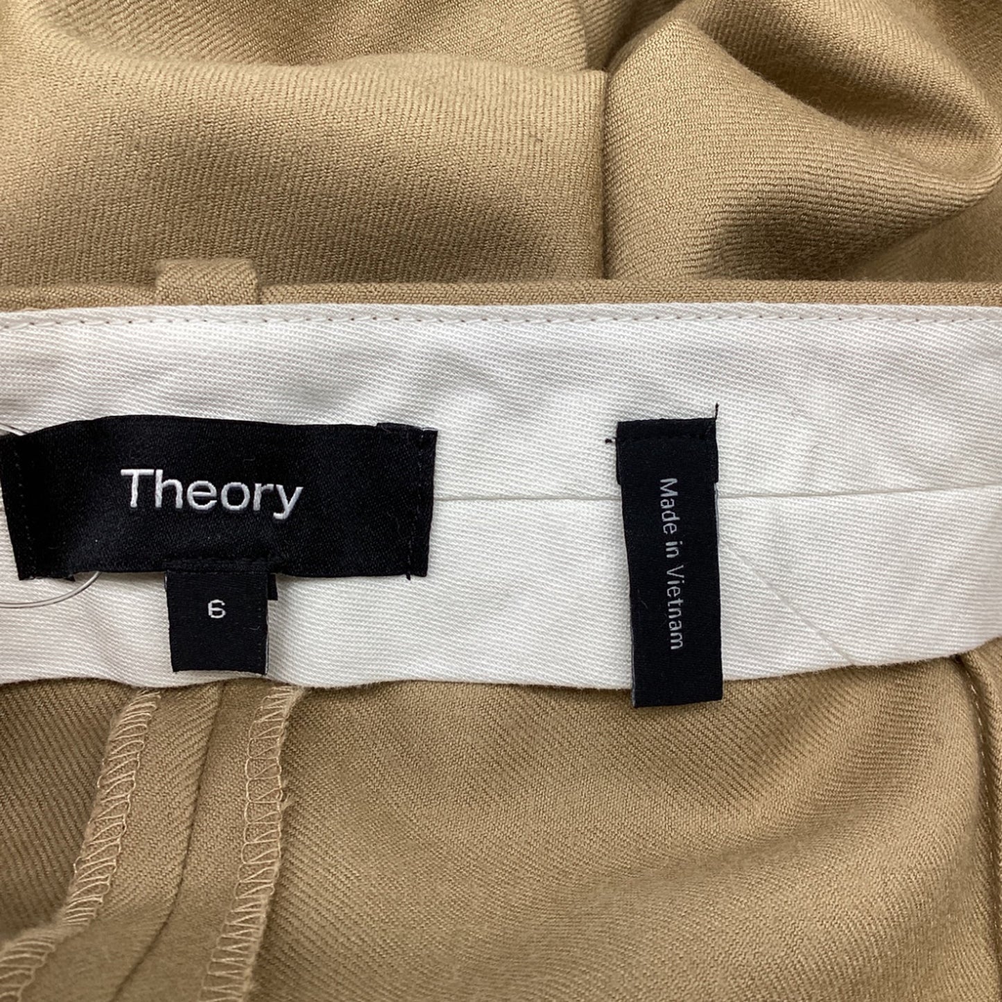 Pantalón de lana de tiro alto color beige