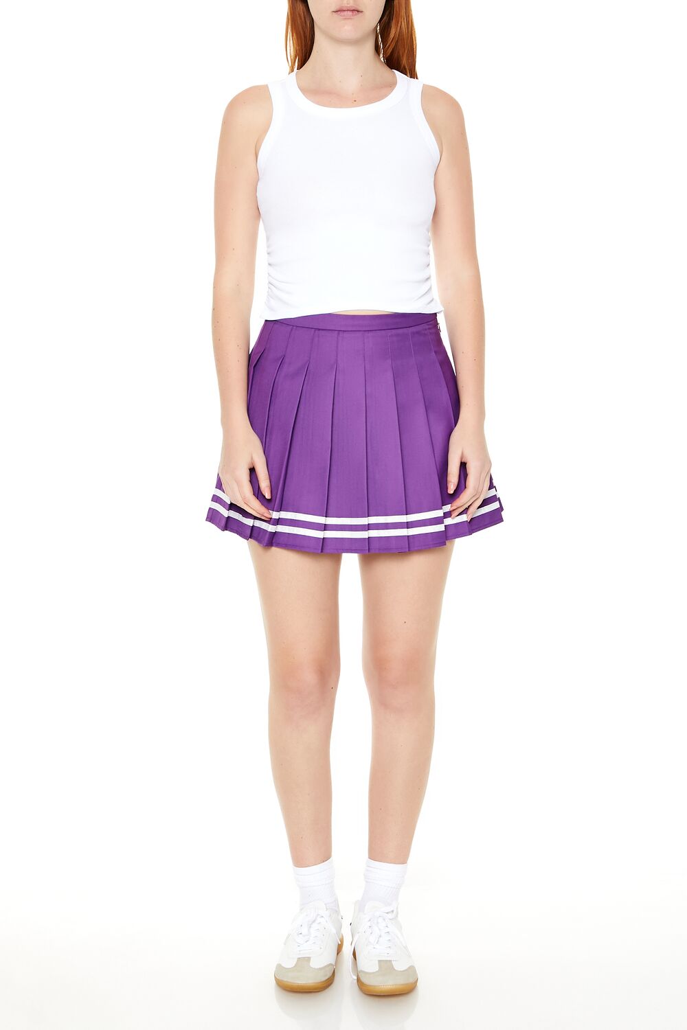 Falda corta a rayas con pliegues