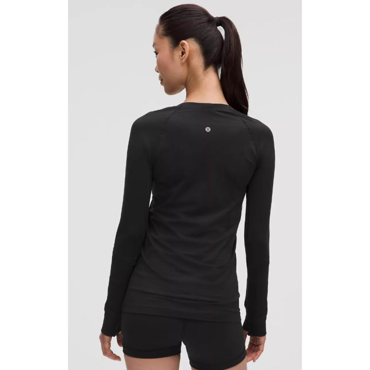 Top de manga larga color negro