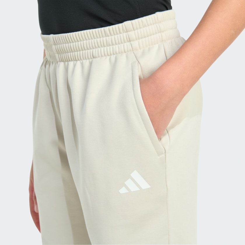Pantalón deportivo infantil a rayas