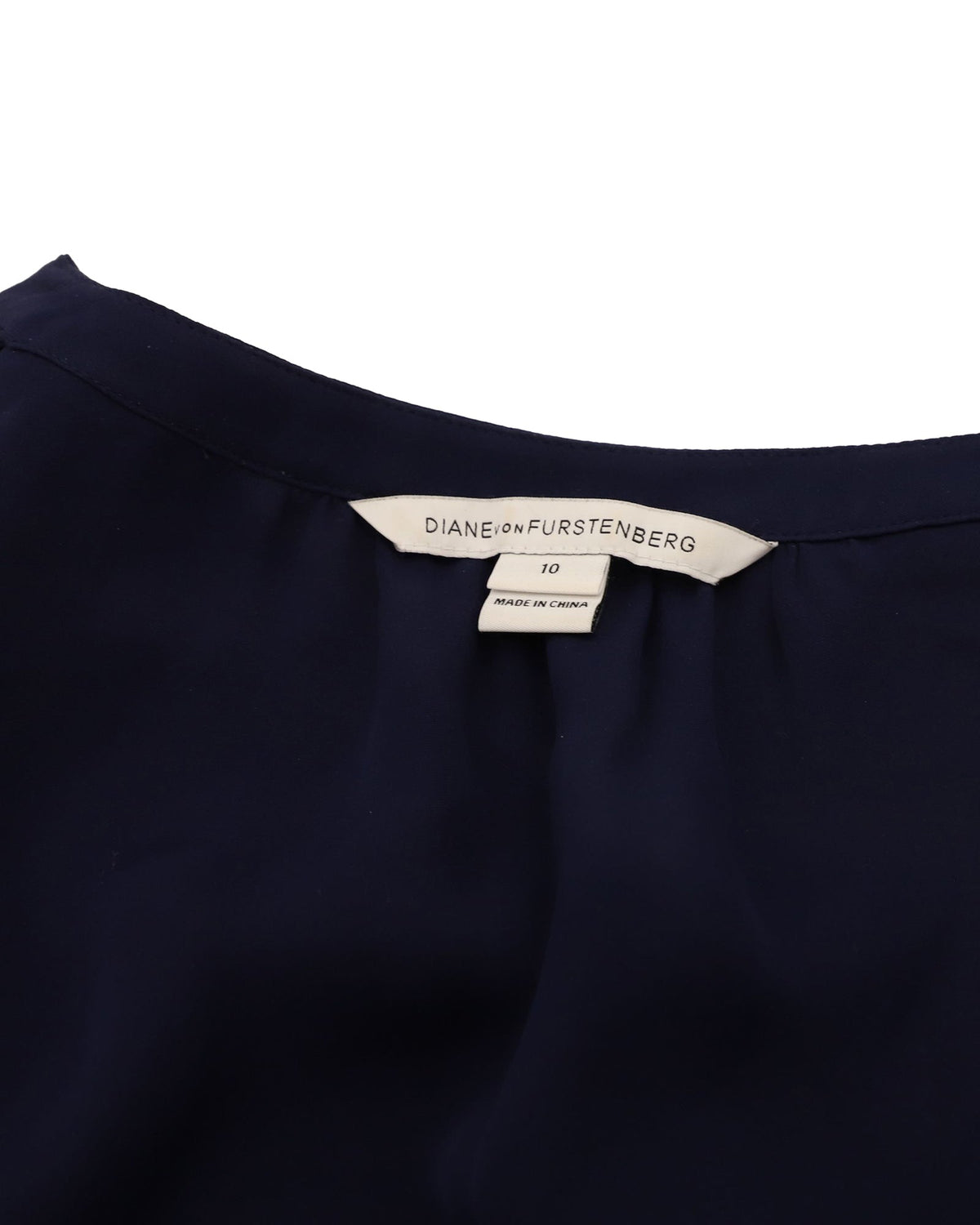 Blusa de seda de manga larga color azul marino