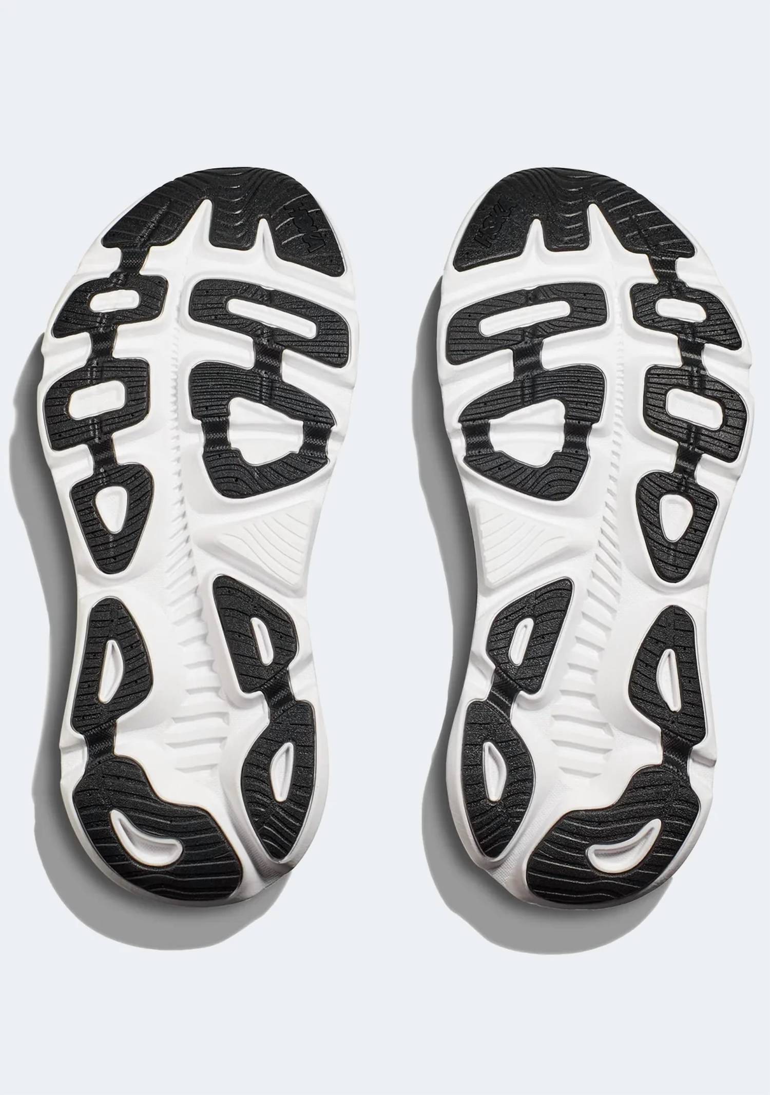 Tenis para correr de mujer color negro y blanco