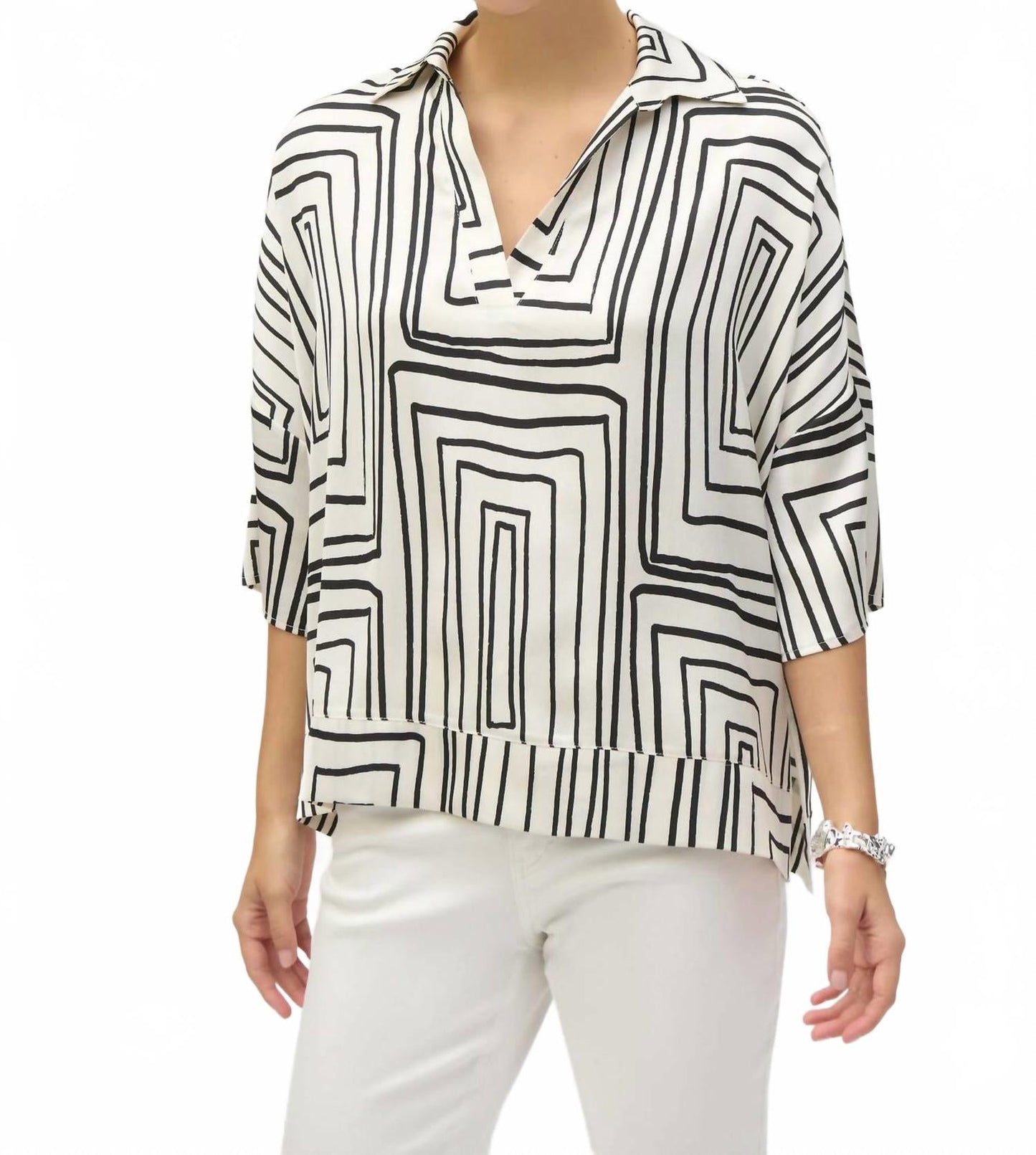 Top de satén color negro y crema