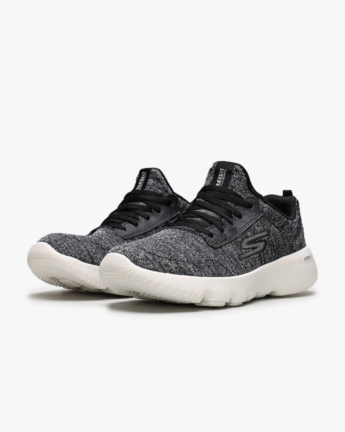 Tenis para correr de mujer color negro y blanco