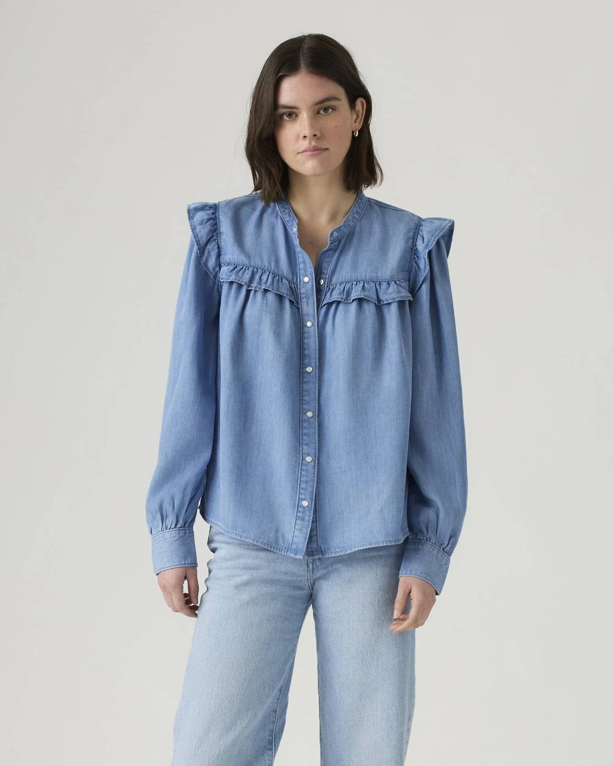 Blusa de mujer de manga larga con boleros color azul
