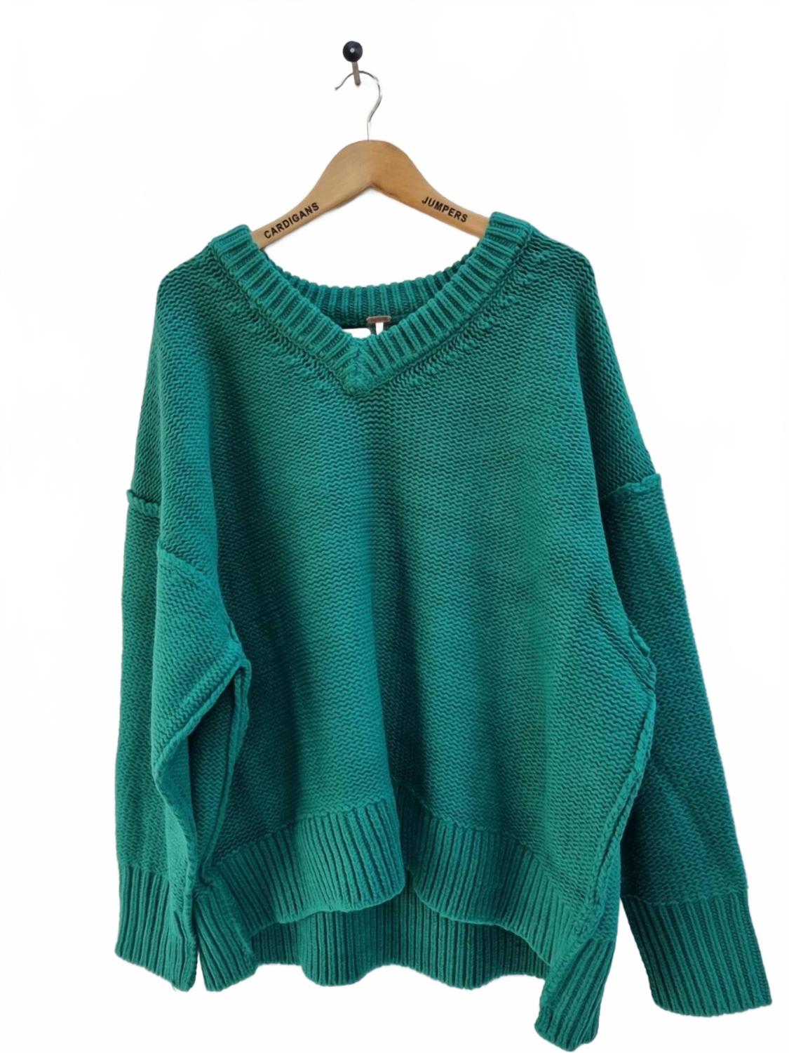 Suéter con cuello en V color verde