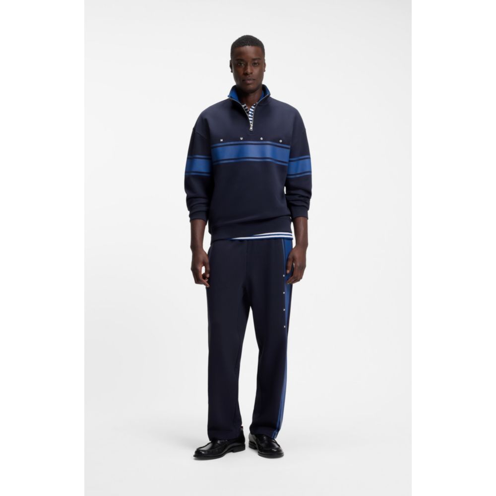 Pantalón deportivo de algodón de corte amplio a rayas