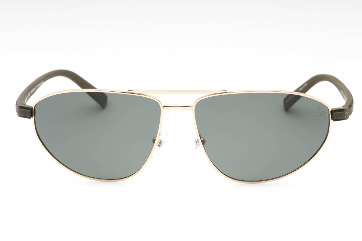 Gafas con lentes polarizados color verde y dorado