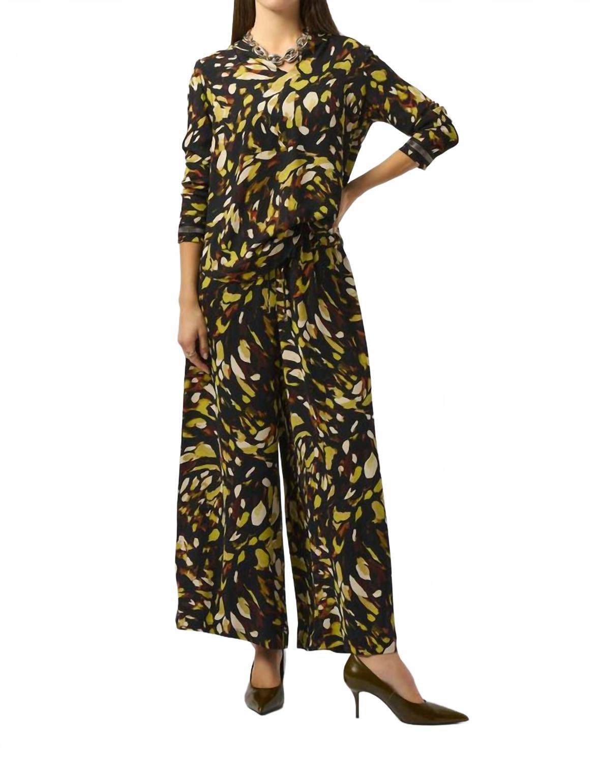 Pantalón de pierna ancha con estampado animal color negro