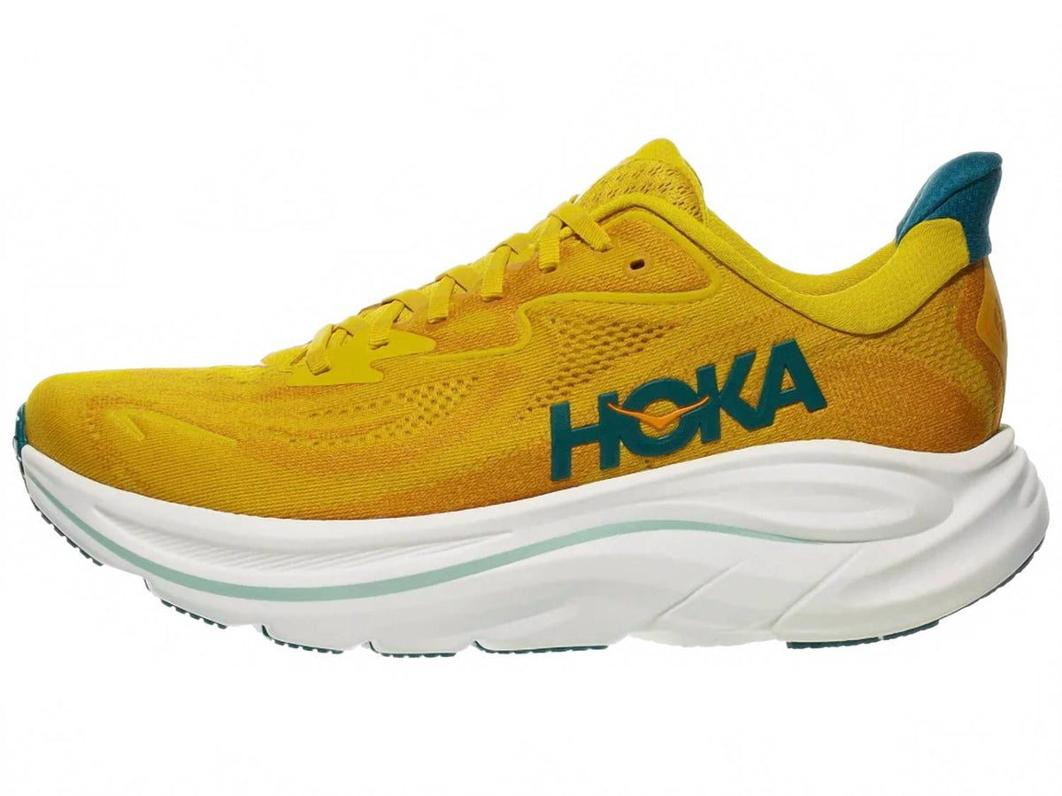 Tenis para correr de hombre color amarillo y dorado