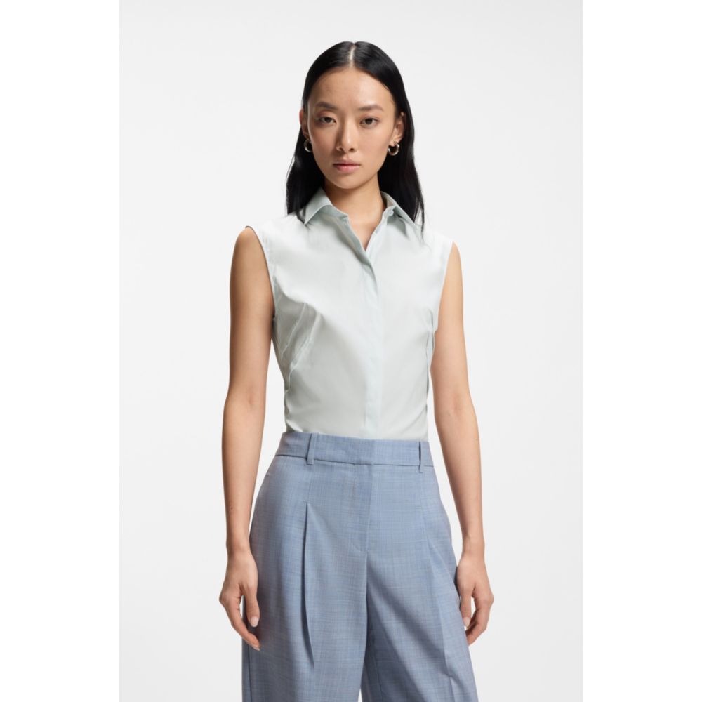 Blusa de mezcla de algodón sin mangas de corte ajustado