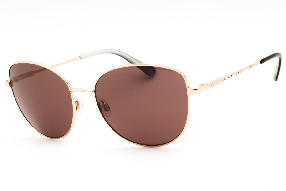 Gafas color café y dorado