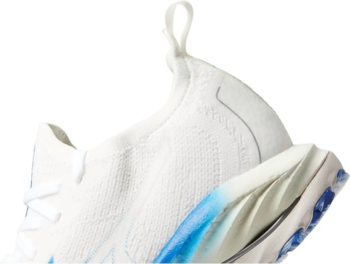 Tenis para correr de mujer color blanco y azul