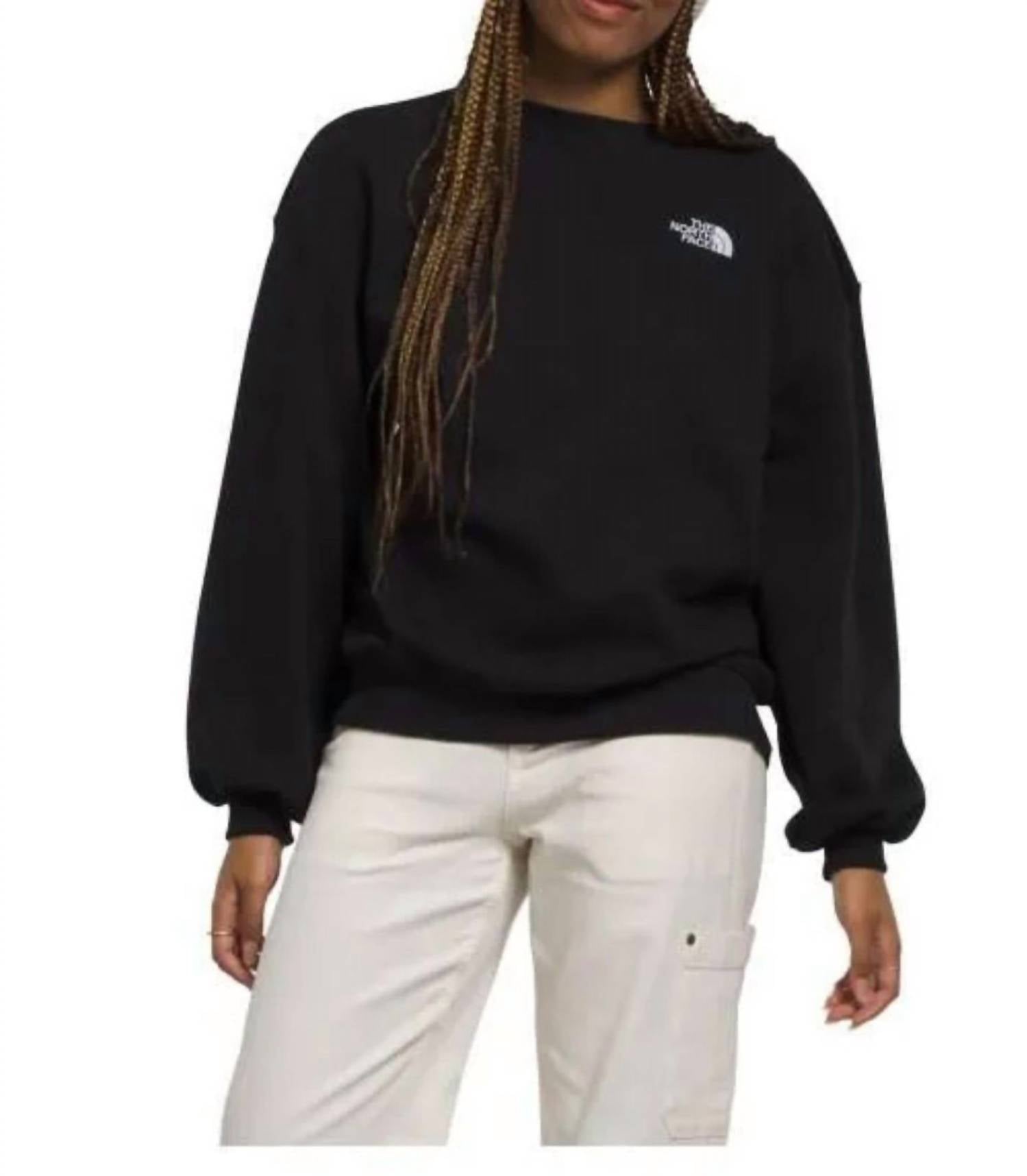 Buzo de mujer con cuello redondo de corte amplio color negro