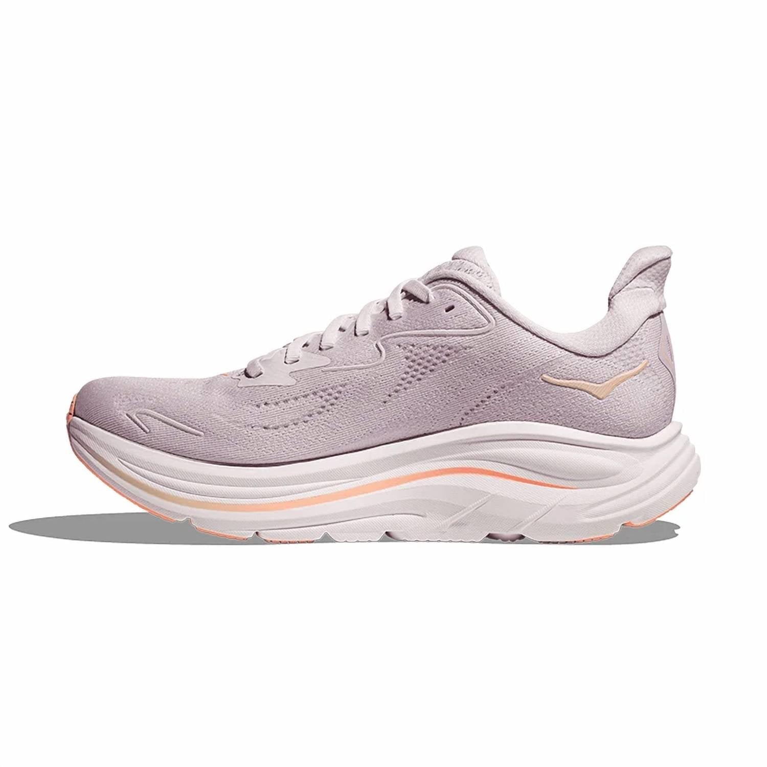 Tenis para correr de mujer color crema y lila