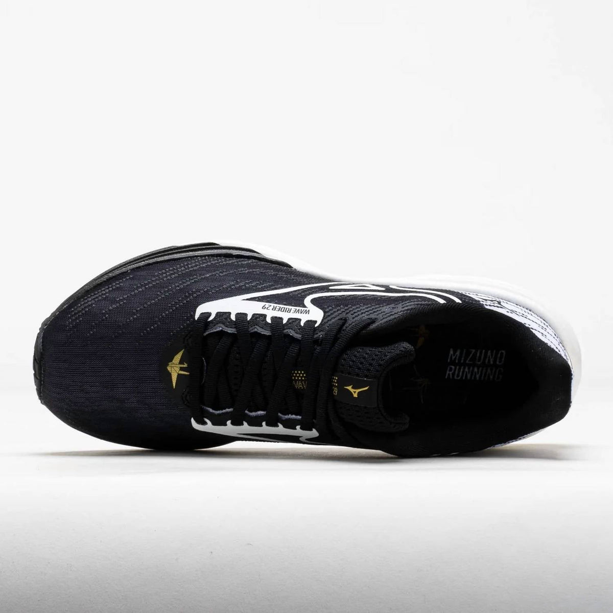 Tenis para correr unisex color negro y dorado