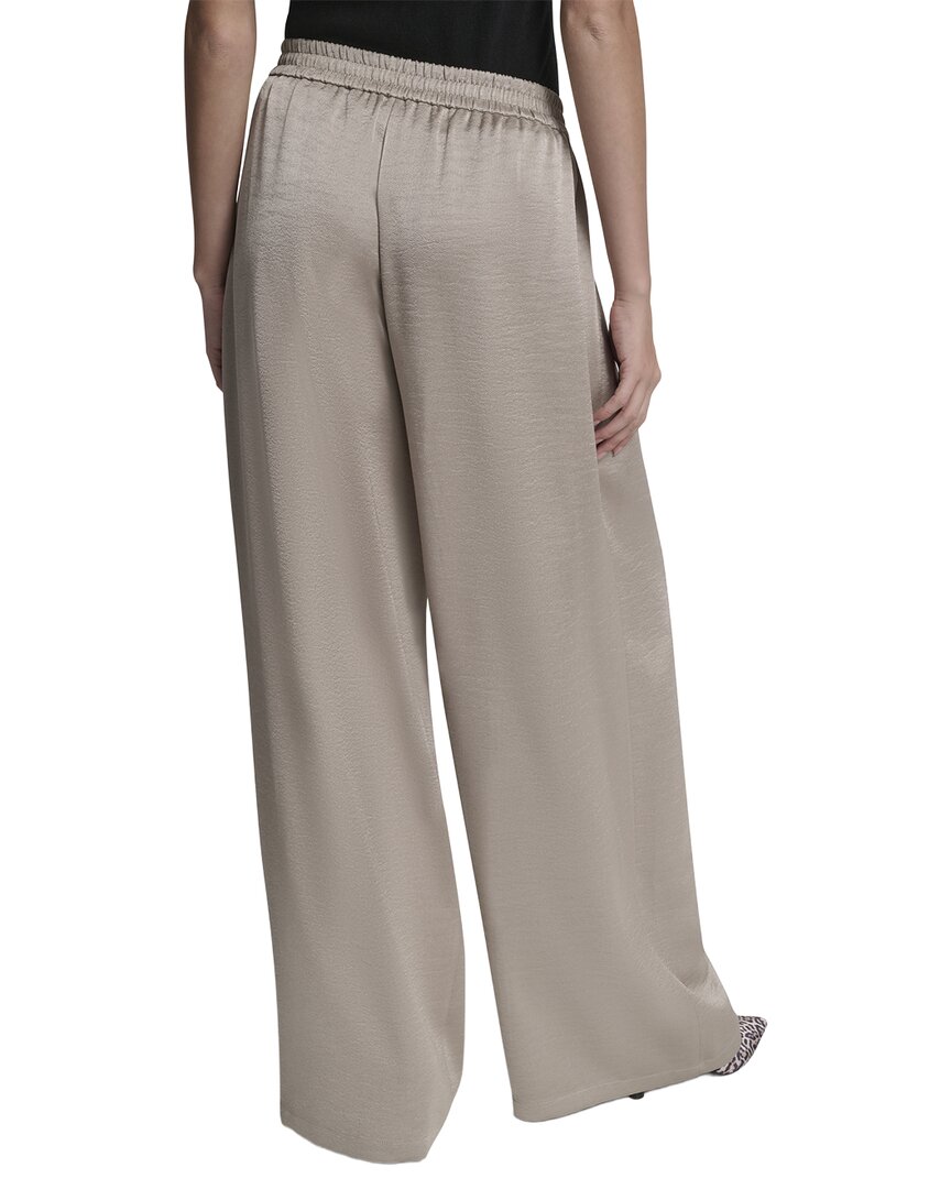 Pantalón de pierna ancha con pliegues