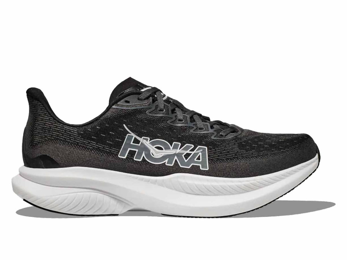 Tenis para correr de hombre color negro y blanco