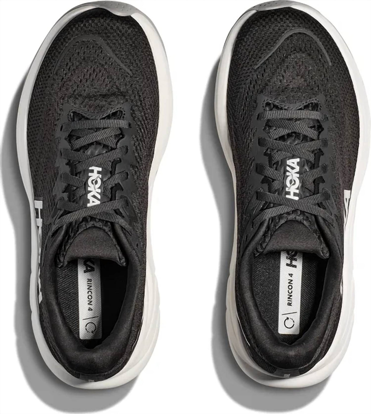 Tenis para correr de mujer color negro y blanco